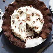 chocolate pie with whipped cream and chocolate shavings